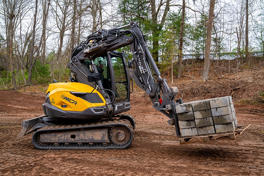 Midigraver en schranklader ineen 9