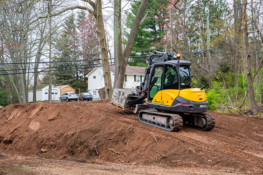 Midigraver en schranklader ineen 2